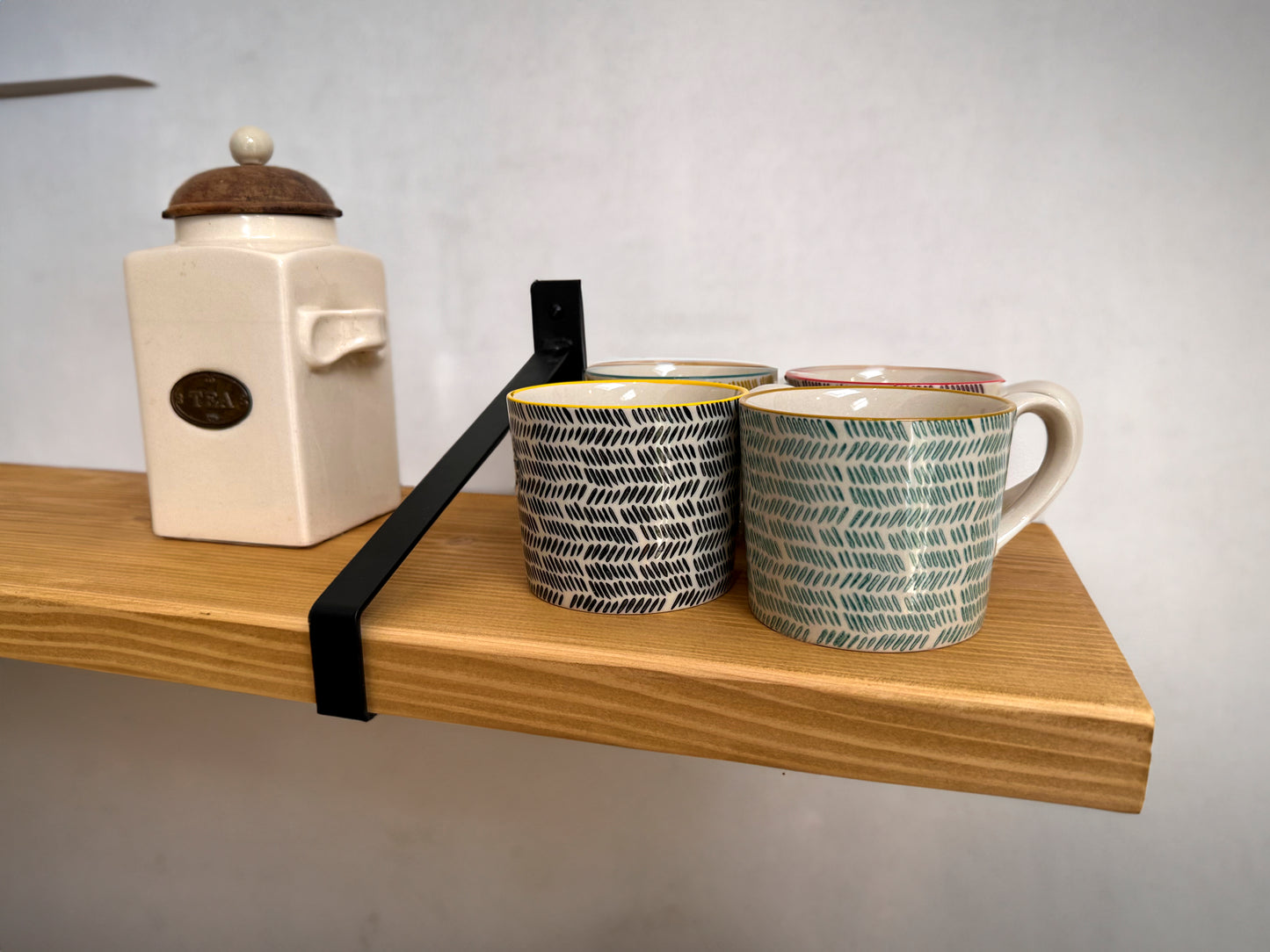 Briwax coloured shelf with suspense style bracket