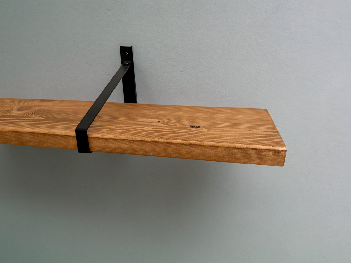 Wooden shelf on suspense bracket with Fiddes colour range
