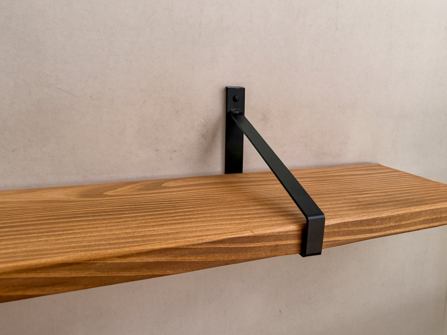 Wooden shelf on suspense bracket with Fiddes colour range