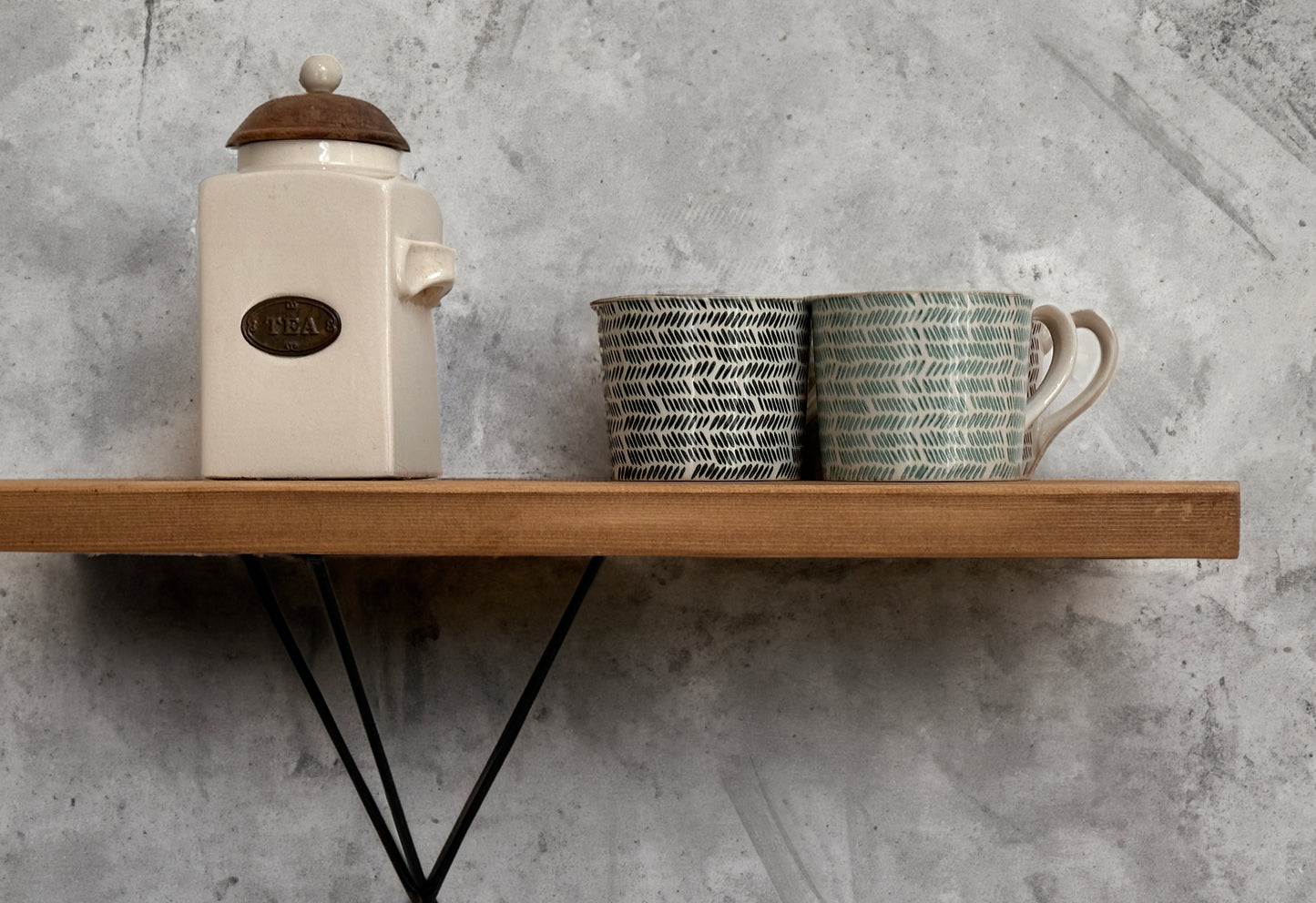 Wooden shelf on prism bracket with Fiddes colour range