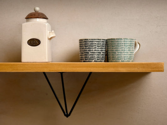 Wooden shelf on prism bracket with Fiddes colour range
